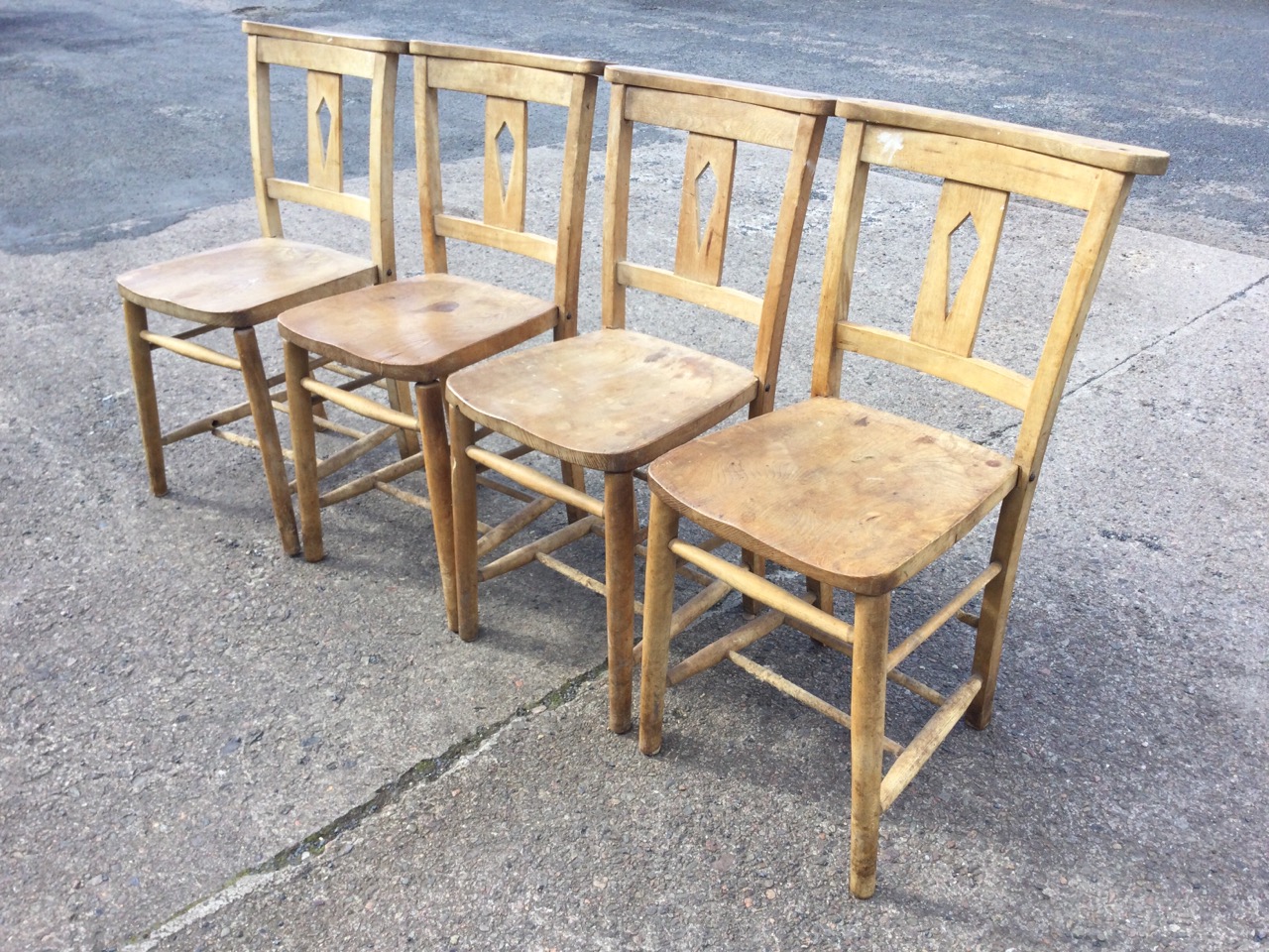 A set of four beech and elm church chairs with shaped flat backs and pierced splats above solid - Image 3 of 3