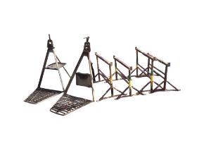 Two pairs of builders adjustable trestles on tubular supports with angled legs; and a pair of