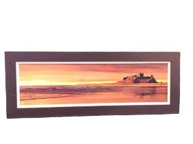 Jim Kearney, photographic canvas evening coastal view of Bamburgh Castle, the label verso numbered