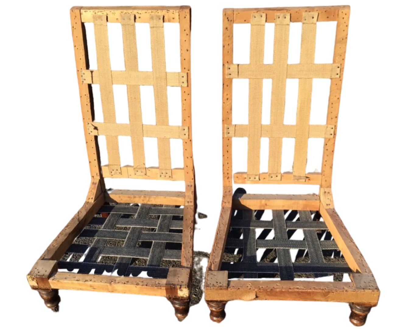 A pair of "stripped back" and re-webbed Victorian chairs, the frames with high backs and tapering