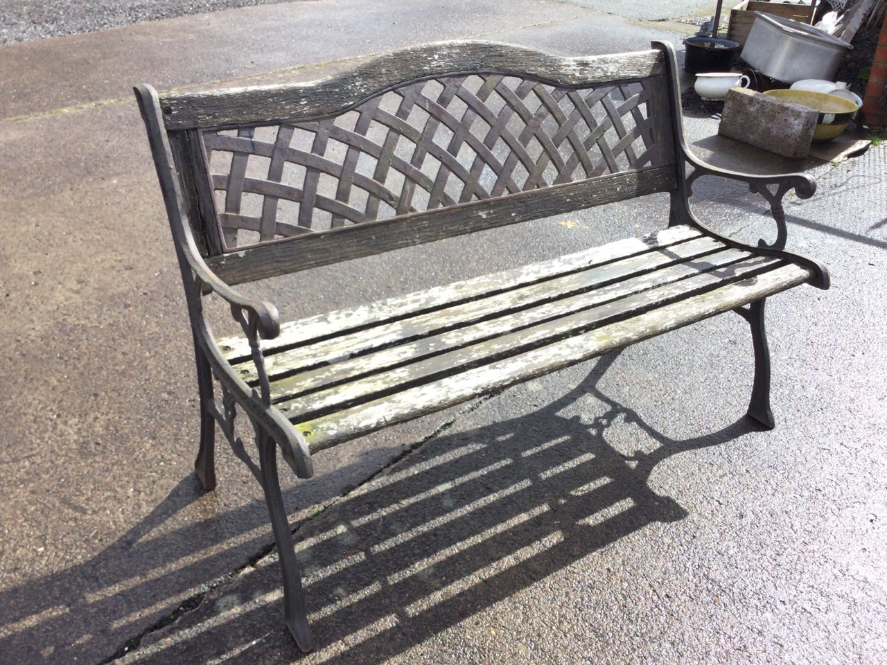 A garden bench with latticework arched metal panel to back above a wood slatted seat, the scrolled - Image 3 of 3