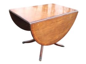 A Georgian style mahogany dropleaf dining table, the crossbanded top with two demi-lune leaves