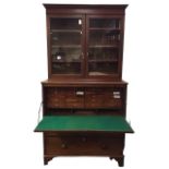 A married Victorian mahogany secretaire estate bookcase, the top with moulded cornice above glazed