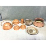 Three ancient Iranian copper vessels with Islamic decoration; four copper cooking moulds; and an