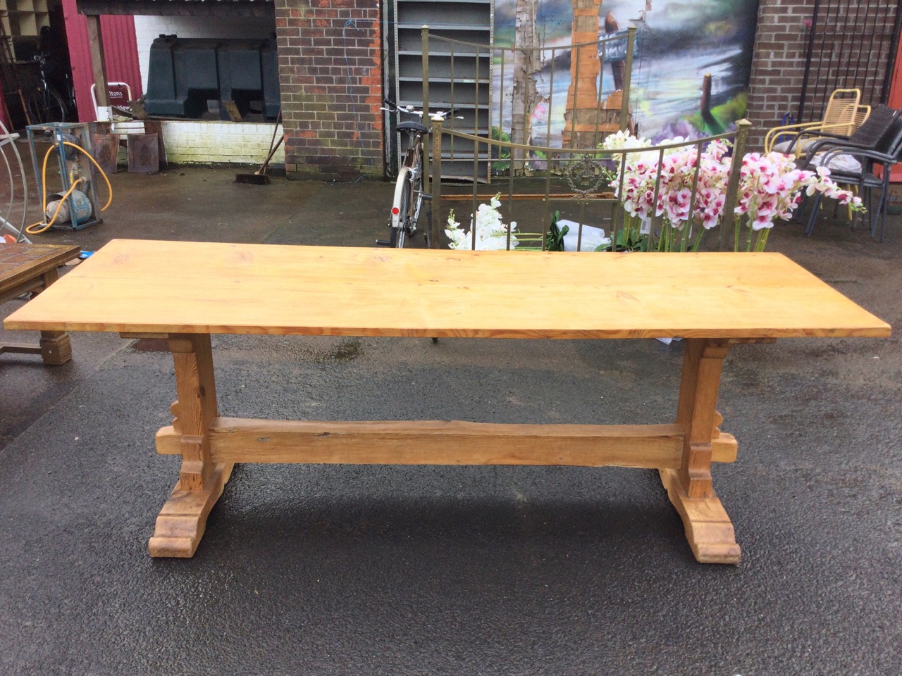 A pine refectory table with long rectangular top on shaped trestle type supports with sledge feet - Image 2 of 3
