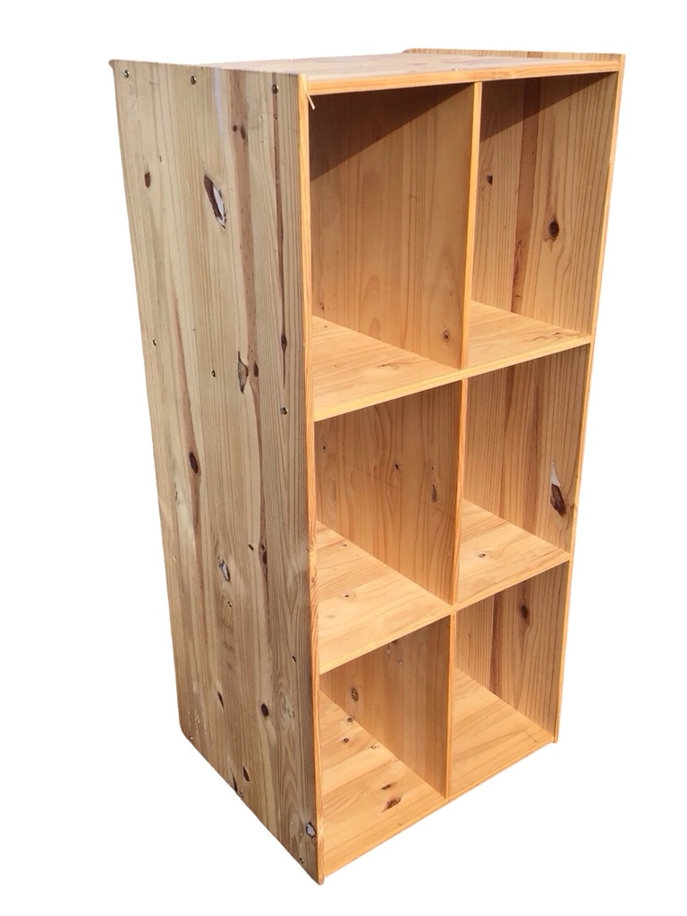 A pine shelf unit with six deep compartments. (22.75in x 19in x 49.75in)