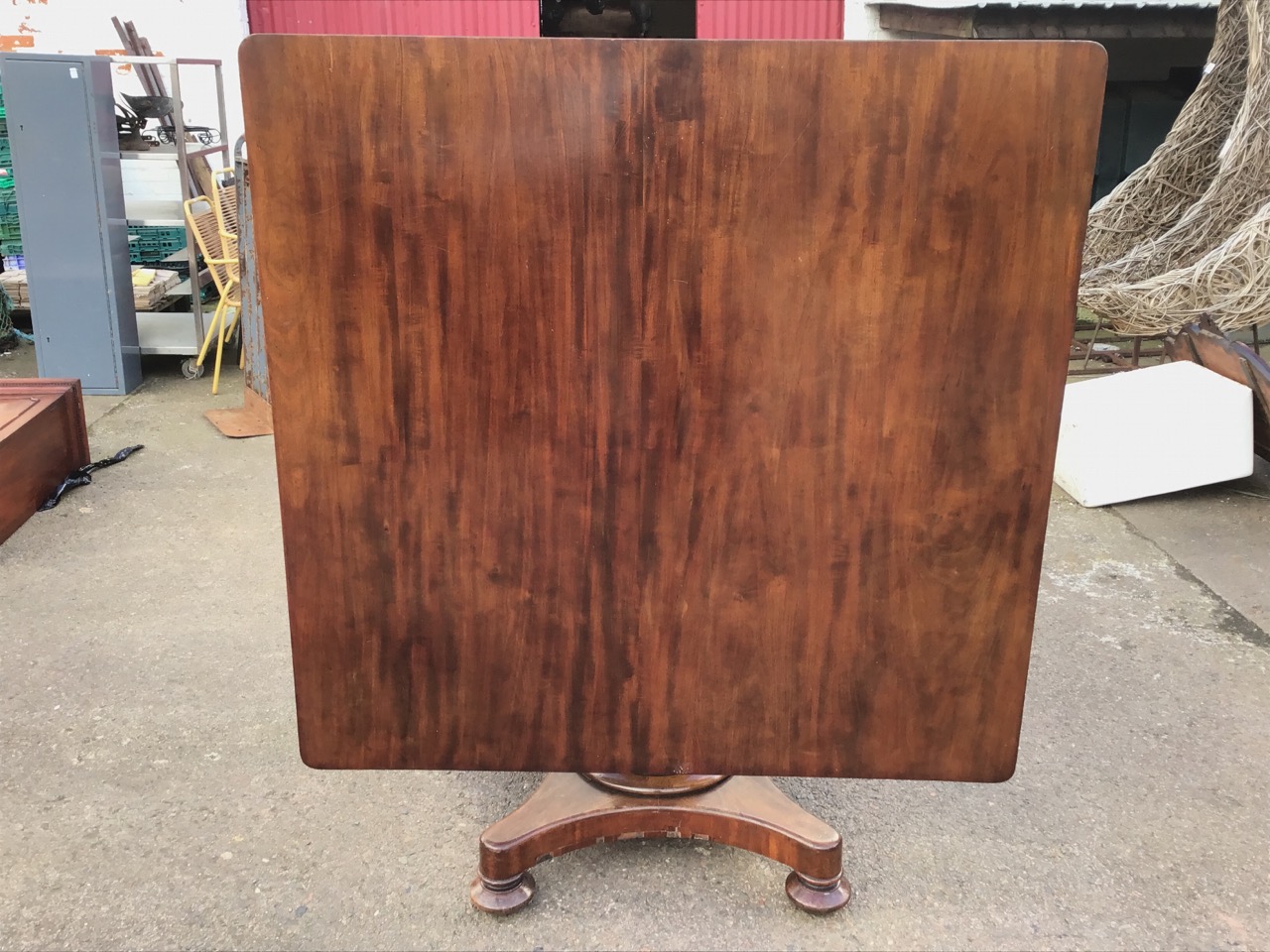 A William IV mahogany breakfast table, the rectangular top tilting on a tapering flared octagonal - Image 2 of 3