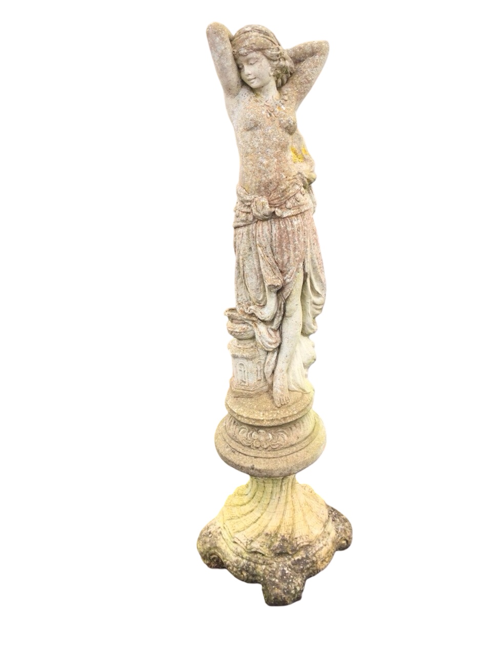 An art nouveau style composition stone garden statue of an elegant lady standing by urn on