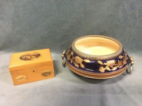 An Edwardian bowl with silver plated mounts and swing handles, decorated with floral gilt enamelling