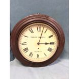 A Victorian circular wall clock by Duncan Campbell - Alnwick, with moulded metal case and glazed