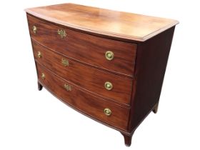 A nineteenth century mahogany bowfronted chest with moulded top above three long cockbeaded
