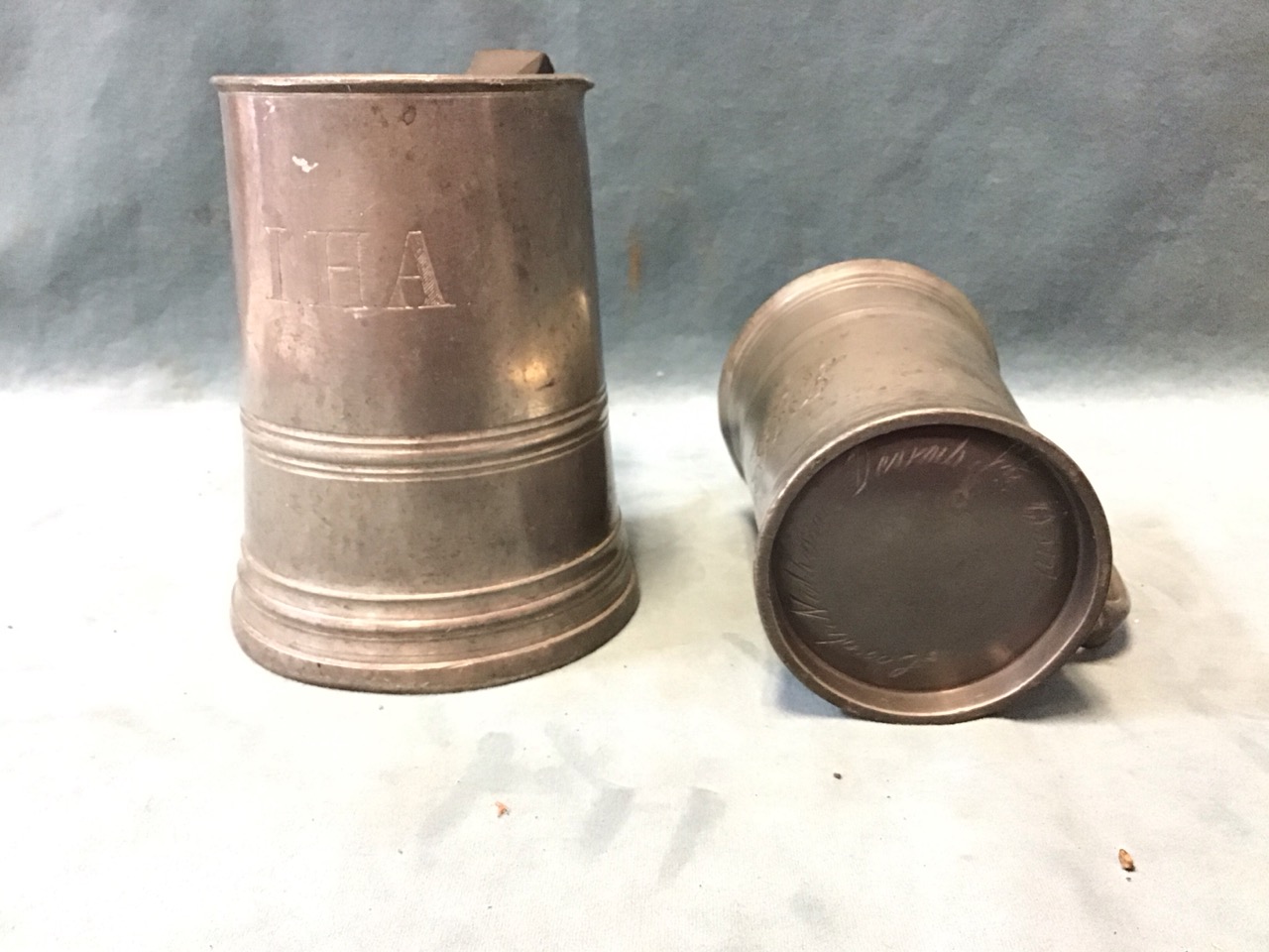 A Victorian pewter quart tankard with turned bands & engraved initials; an antique pewter flared - Image 2 of 3