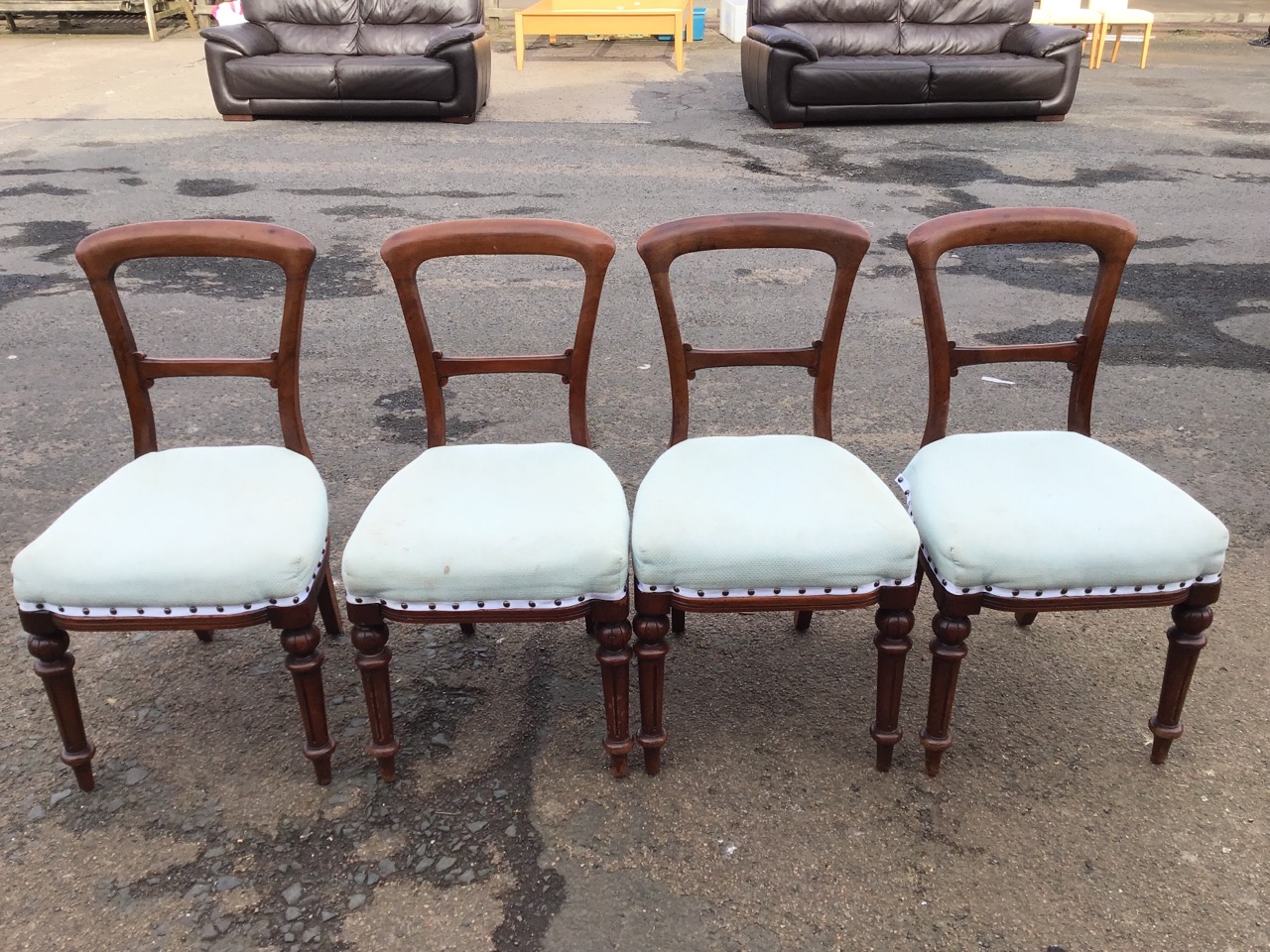 A set of four Victorian mahogany dining chairs with arched backs and scrolled rails above bowfronted - Image 2 of 3