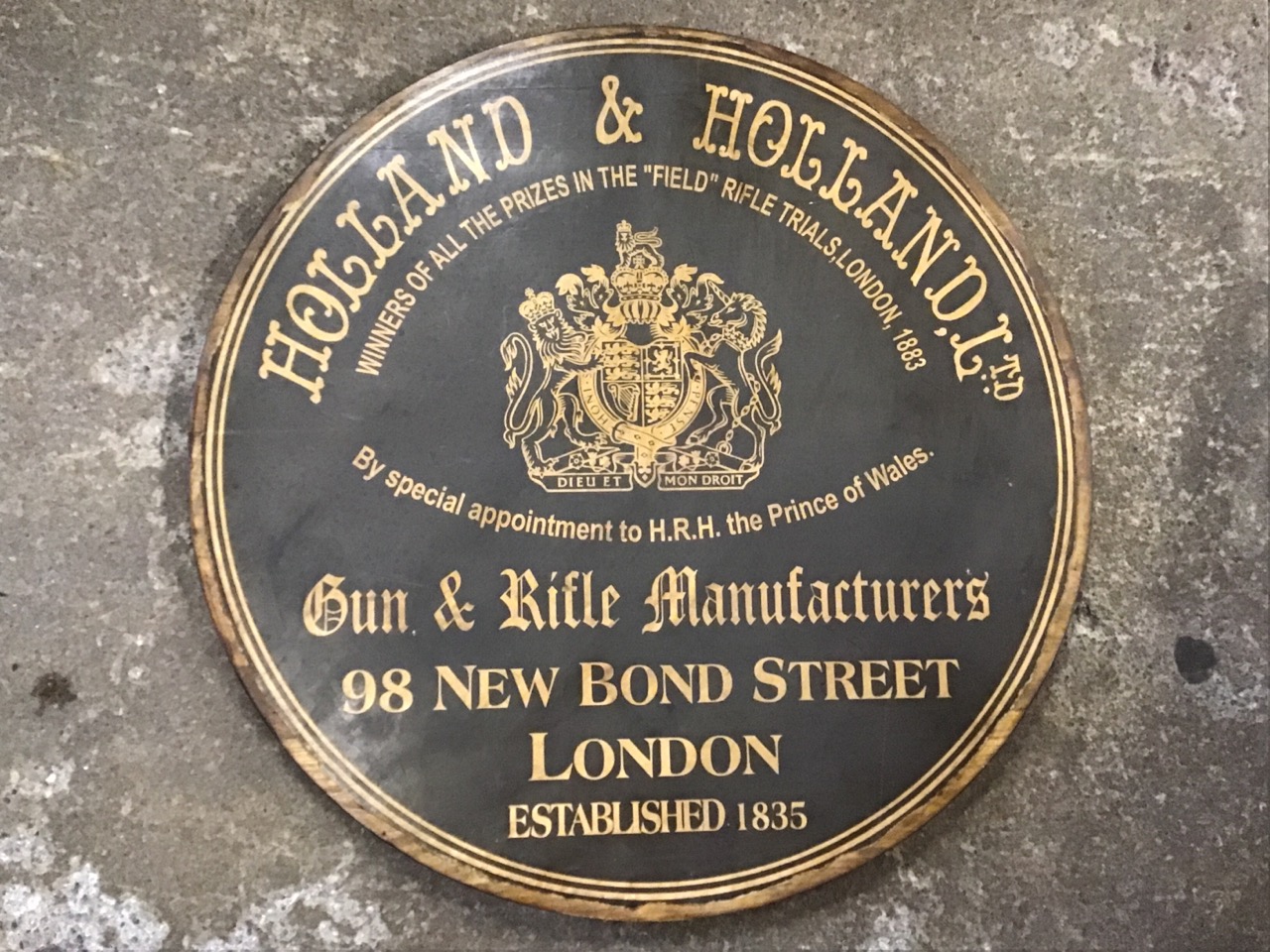 A circular pine board with printed advertisement for Holland & Holland gun & rifle manufacturers - - Image 3 of 3