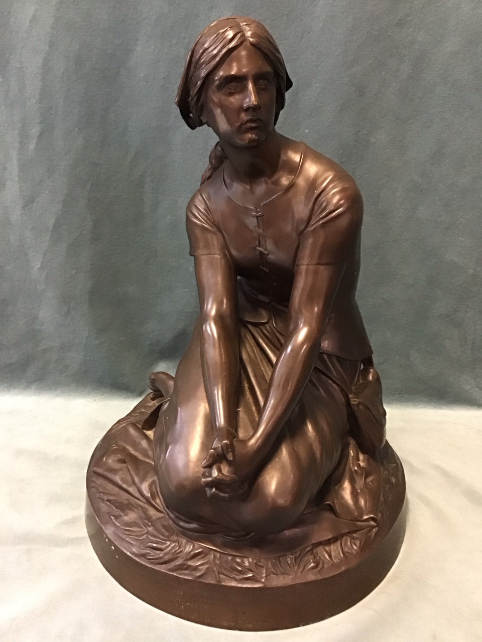 Henri Chapu, large bronze figure of a seated shepherdess representing Joan of Arc, after the 1870