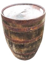 A bulbous oak whisky barrel with staves bound by six riveted metal strap bands. (34.75in)