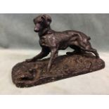 A C19th cast iron figure of a startled spaniel with a dark patina, after Pierre Jules Mêne. (6.5in)