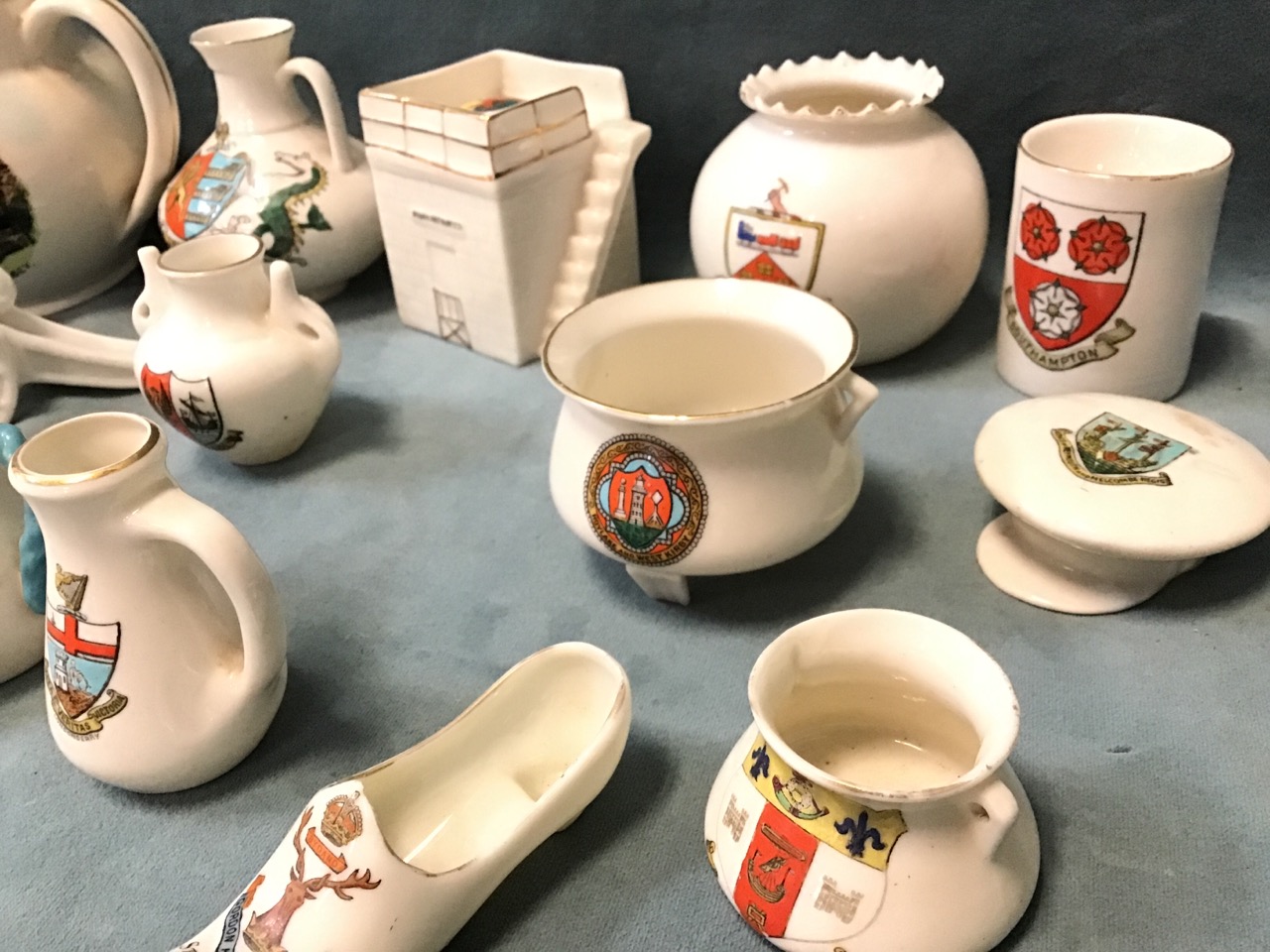 A collection of crested ceramics including two WWI tanks, a cannon, a military cap, a watchtower, - Image 2 of 3