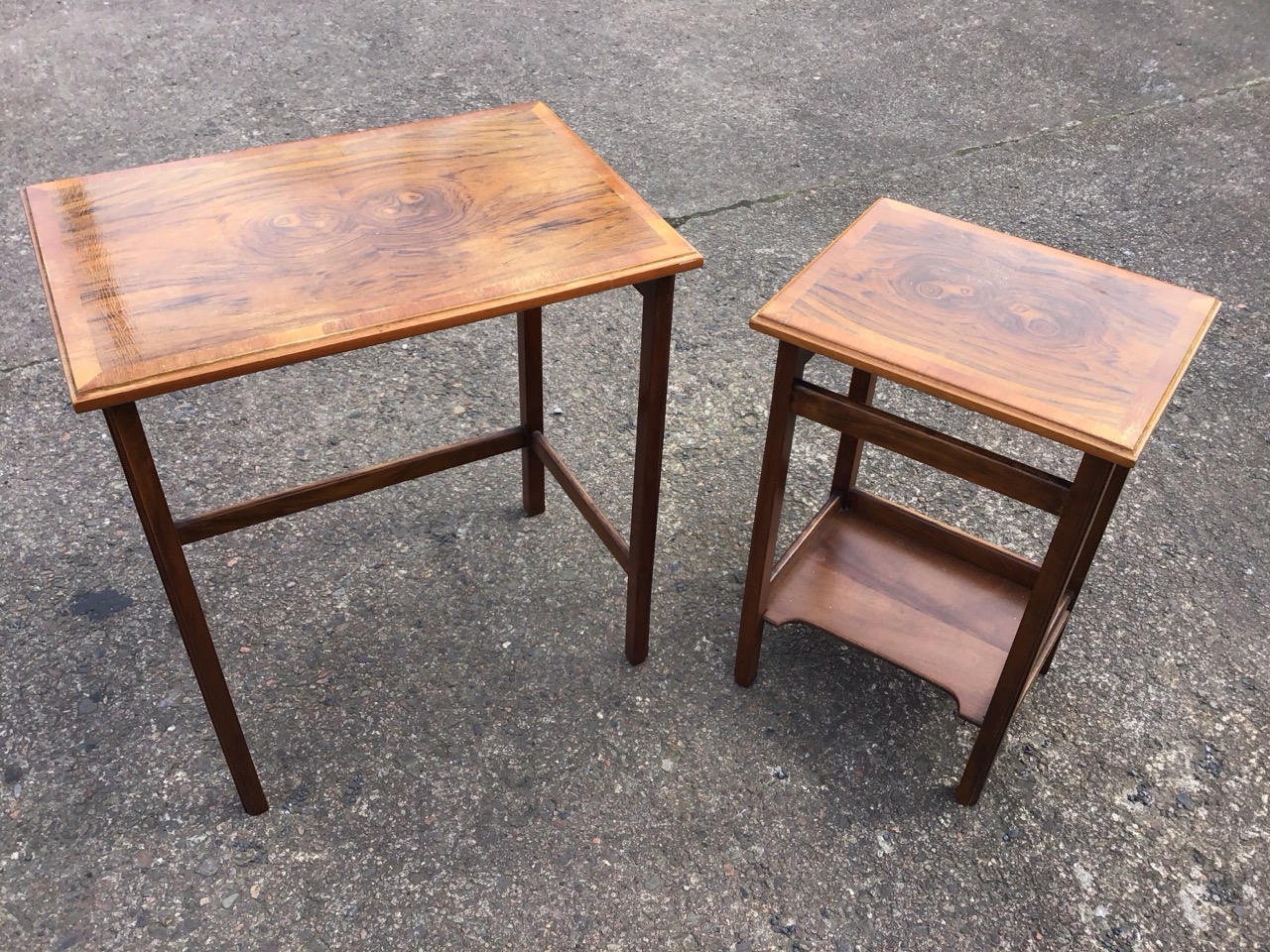 A graduated pair of rectangular walnut coffee tables with crossbanded tops on square moulded - Image 2 of 3