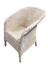 A Lloyd Loom style tub armchair with curved back and arms above a rectangular seat with deep