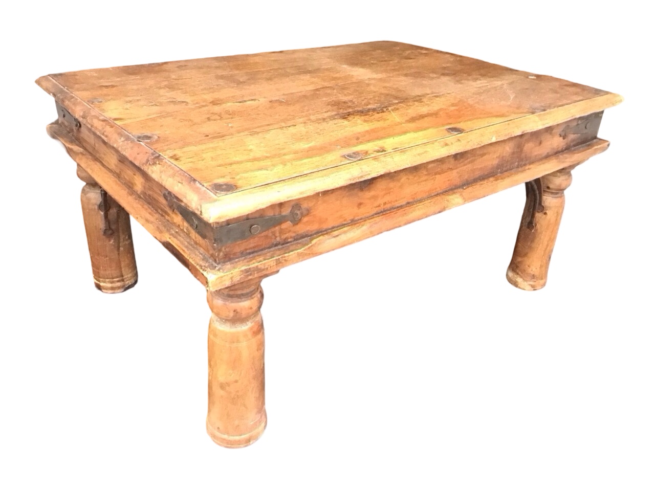 A Rajasthan style hardwood coffee table with rectangular iron studded top above a frieze with iron