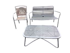 A contemporary painted garden bench & armchair with matching coffee table, having wirework mesh