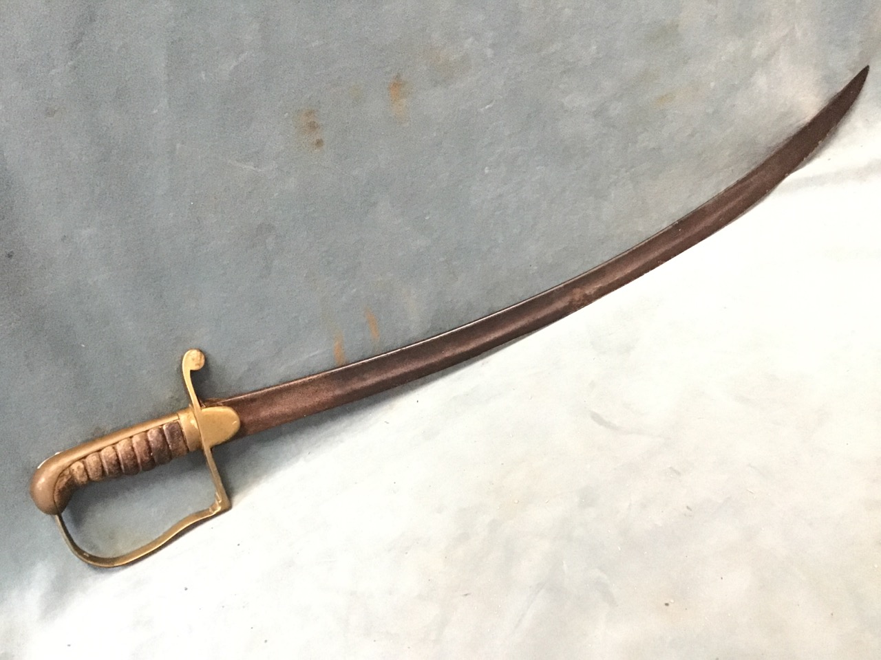 A 1797 pattern Prussian Light Cavalry sabre with brass hilts and ribbed wood grip. (23.5in) - Image 2 of 3