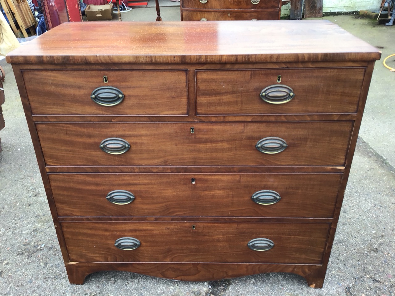 A nineteenth century mahogany chest with two short and three long cockbeaded drawers mounted with - Image 2 of 3
