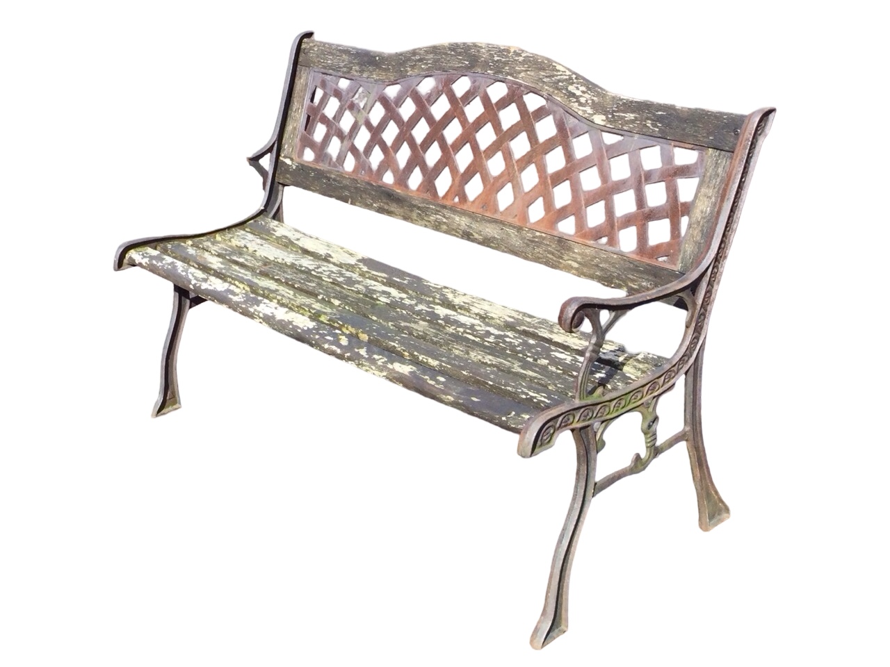 A garden bench with arched latticework panel to back above a wood slatted seat, raised on sabre legs