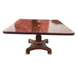 A William IV mahogany breakfast table, the rectangular top tilting on a tapering flared octagonal