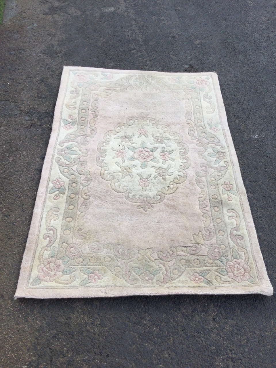 A Chinese wool rug woven in pastel floral shades with central circular medallion on pink field - Image 3 of 3