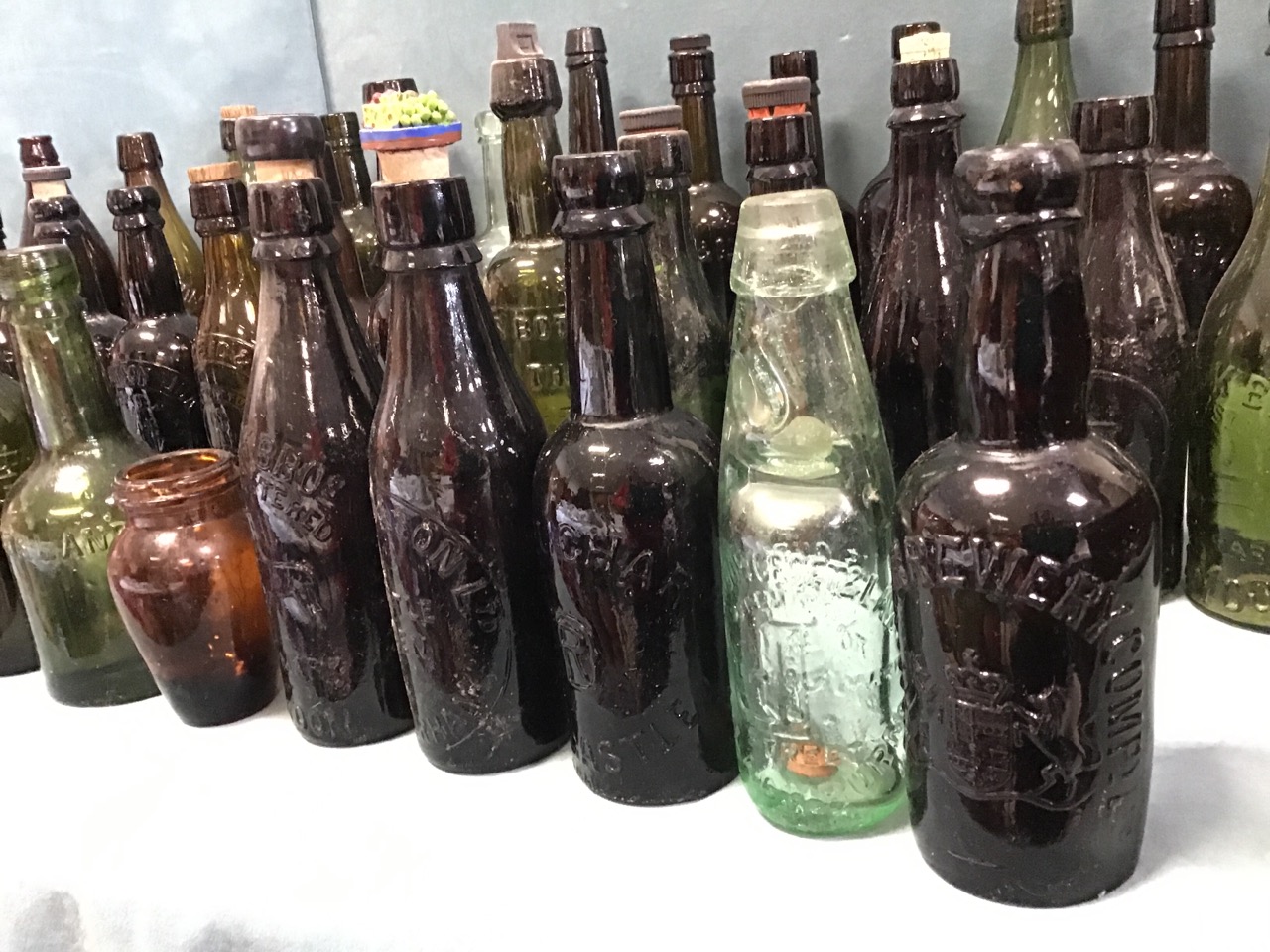 A collection of thirty-nine moulded brewery bottles mainly North Eastern, some with stoppers - Vaux, - Image 2 of 3