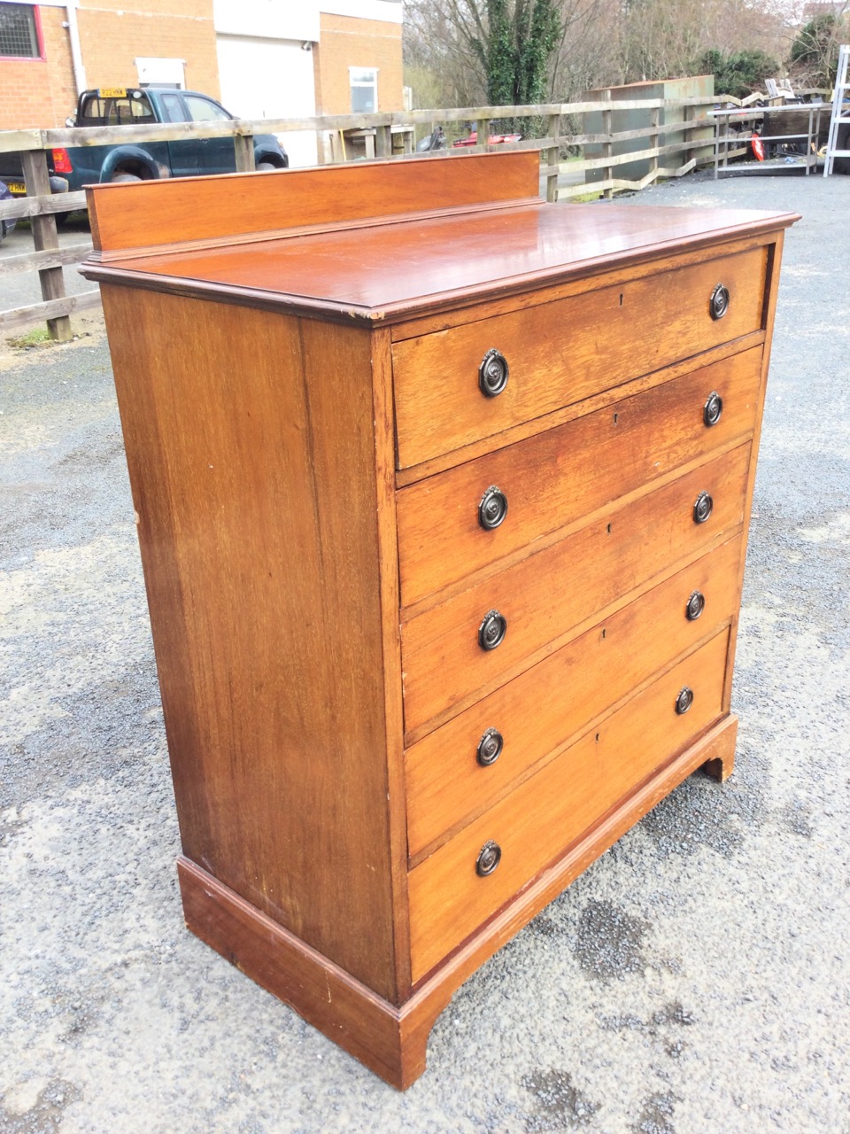 An Edwardian mahogany chest of five long graduated drawers mounted with brass ring rosette - Image 3 of 3