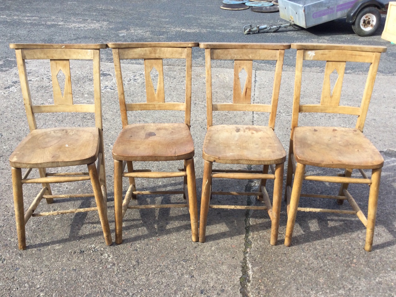 A set of four beech and elm church chairs with shaped flat backs and pierced splats above solid - Image 2 of 3