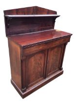 A William IV mahogany chiffonier, the pedimented back with shelf and rectangular top above a