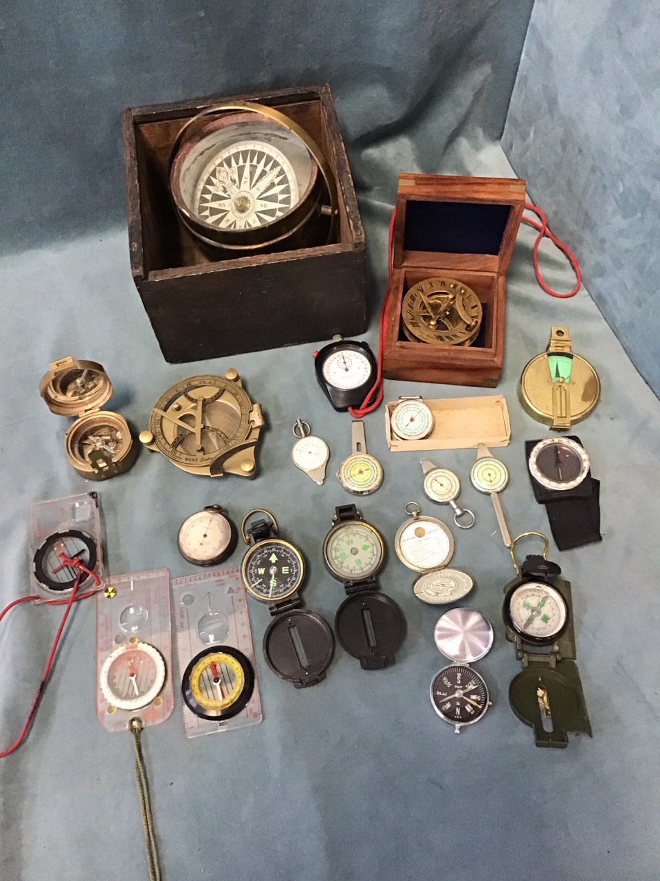 Miscellaneous navigational instruments - orienteering & sighting compasses, an antique oak boxed