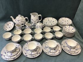 A Johnson Brothers dinner service in the Denmark Blue pattern with cups, saucers, plates, teapot,