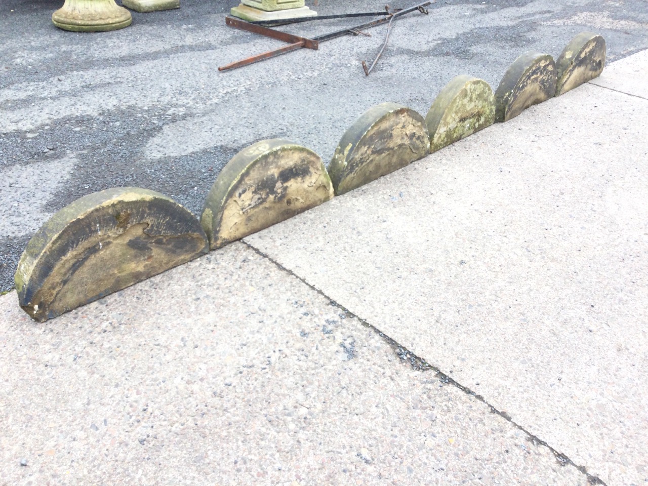 A set of six carved arched sandstone discs. (9.5in x 18.5in x 3in) (6) - Image 2 of 3