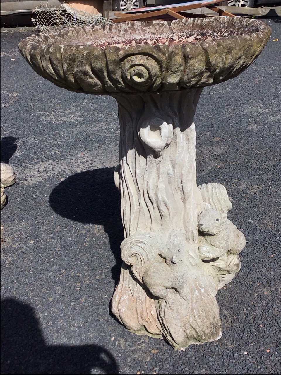 A composition stone birdbath of moulded log form, with circular bowl on treetrunk mounted with - Image 2 of 3