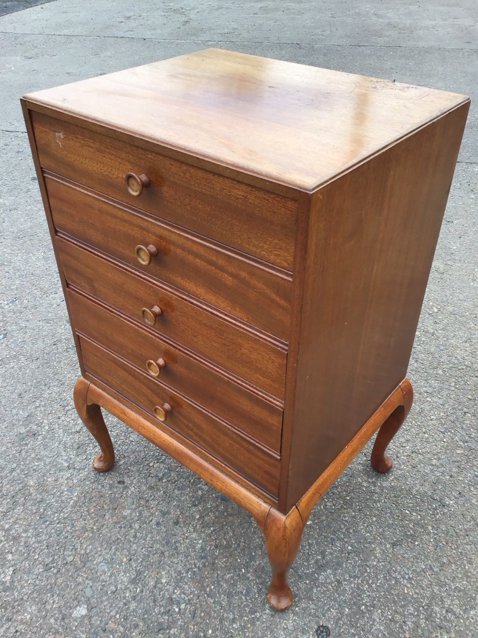 A mahogany music cabinet with five moulded knobbed drop-down drawers, raised on - Image 3 of 3