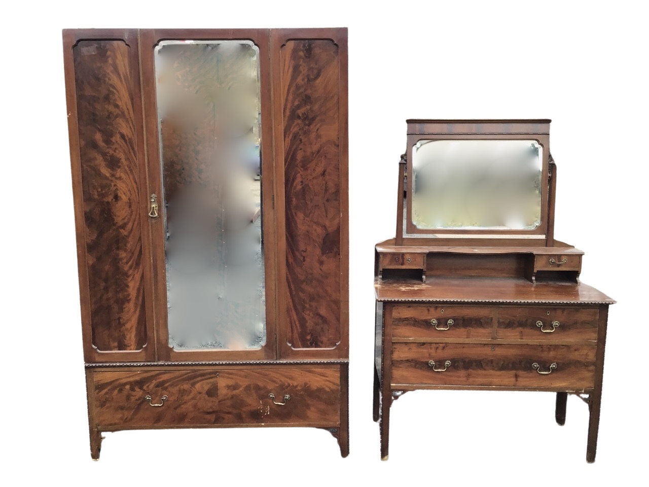 An Edwardian mahogany dressing table and wardrobe, the chest with bevelled mirror on tapering