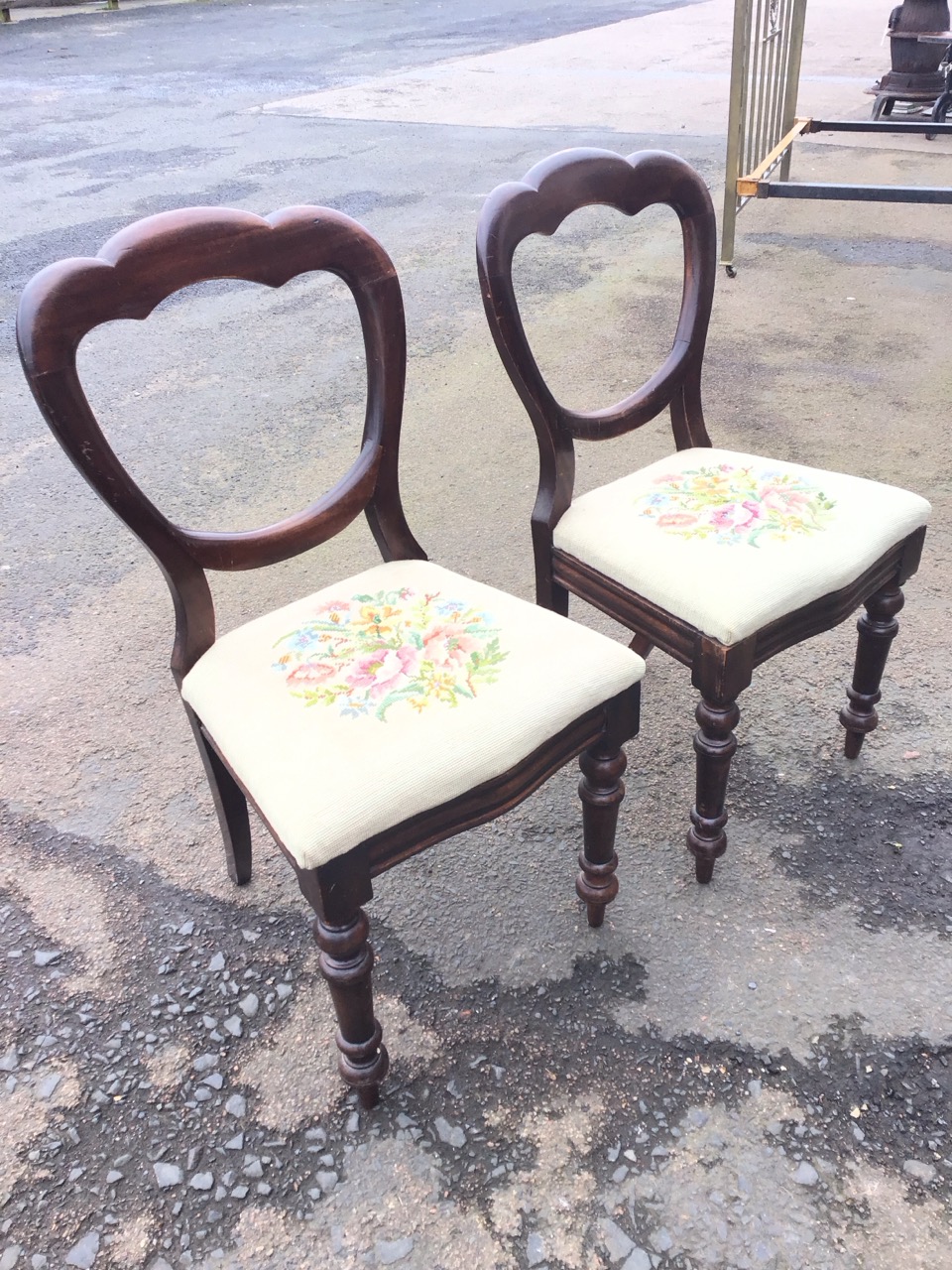 A pair of Victorian mahogany balloon-back chairs with drop-in upholstered seats, raised on turned - Image 3 of 3