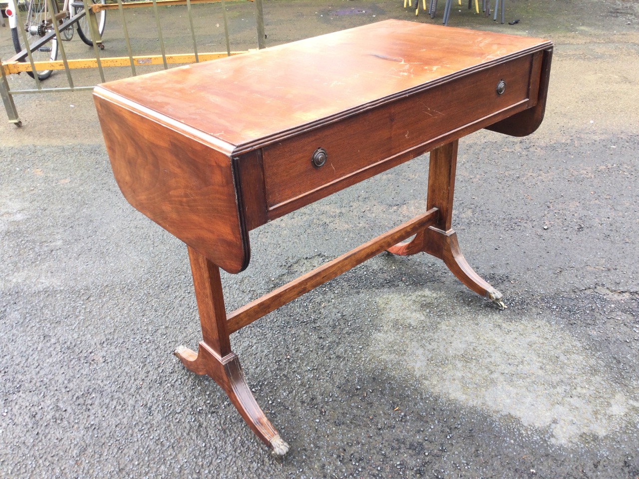 A regency style mahogany sofa table, the rectangular ribbed edge top with two drop leaves, above a - Image 3 of 3