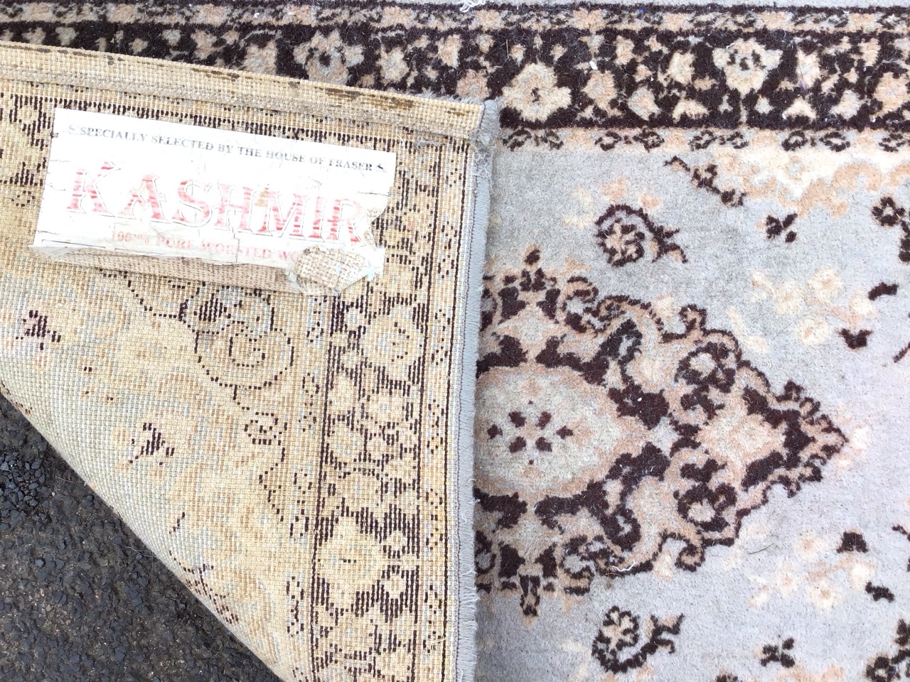A Kashmir style wool rug with central scrolled medallion on a pale blue ground with conforming - Image 2 of 3