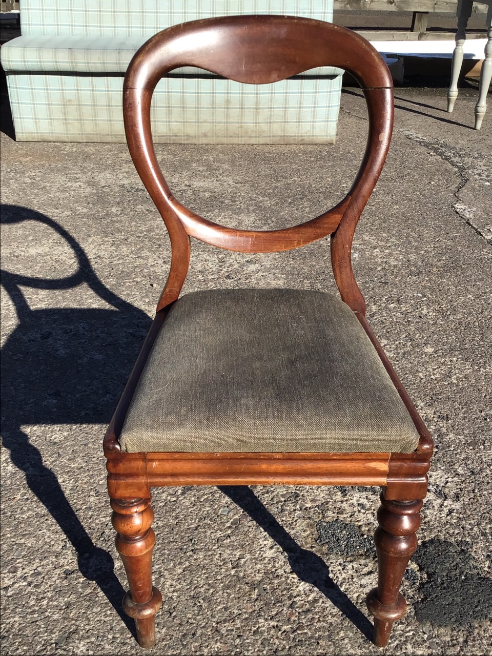 A Victorian mahogany balloon back chair with a drop-in upholstered seat on moulded rails, raised - Image 2 of 3