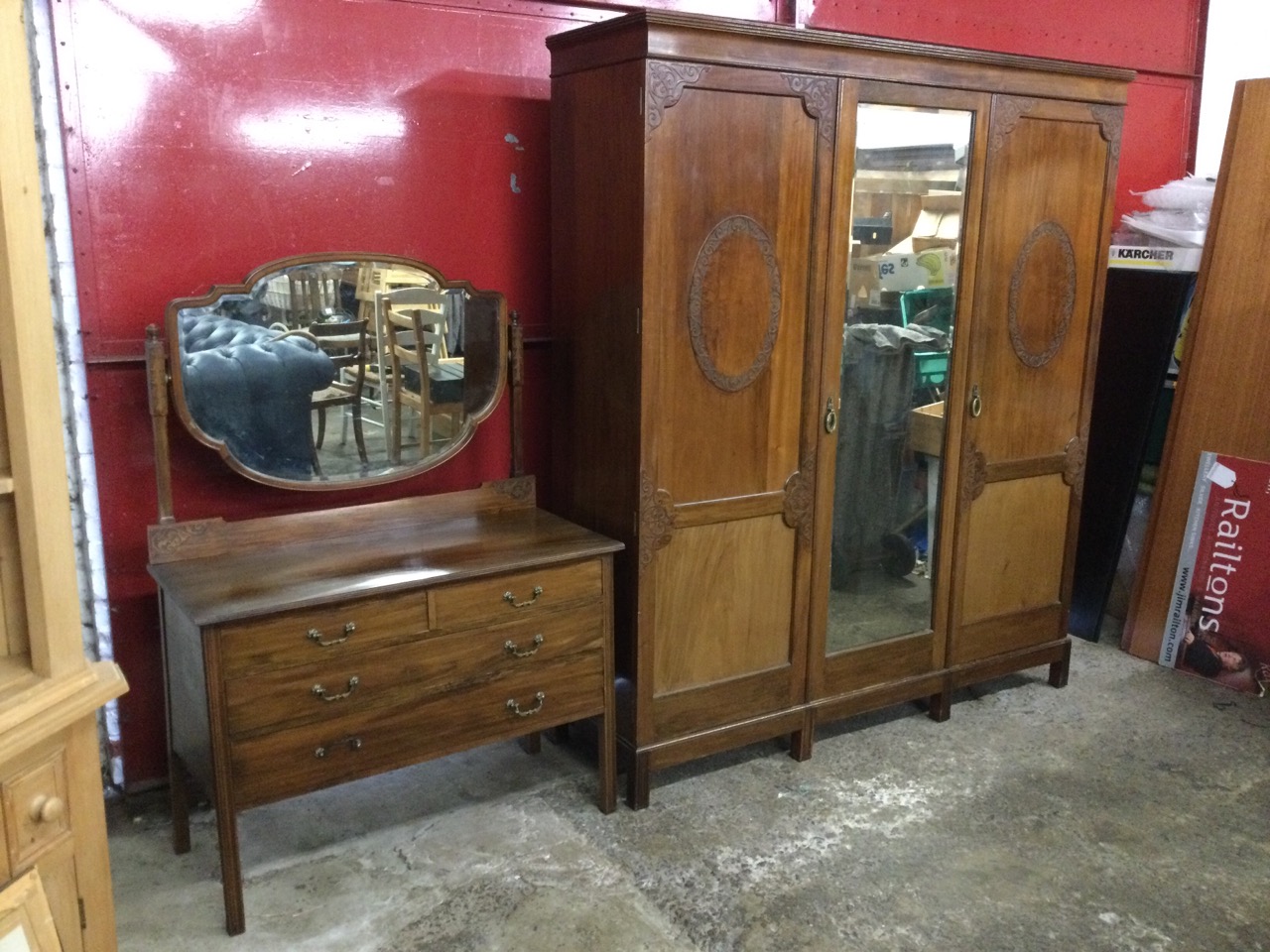 An Edwardian mahogany wardrobe & dressing table with blind fretwork decoration by Gullachsen & Son