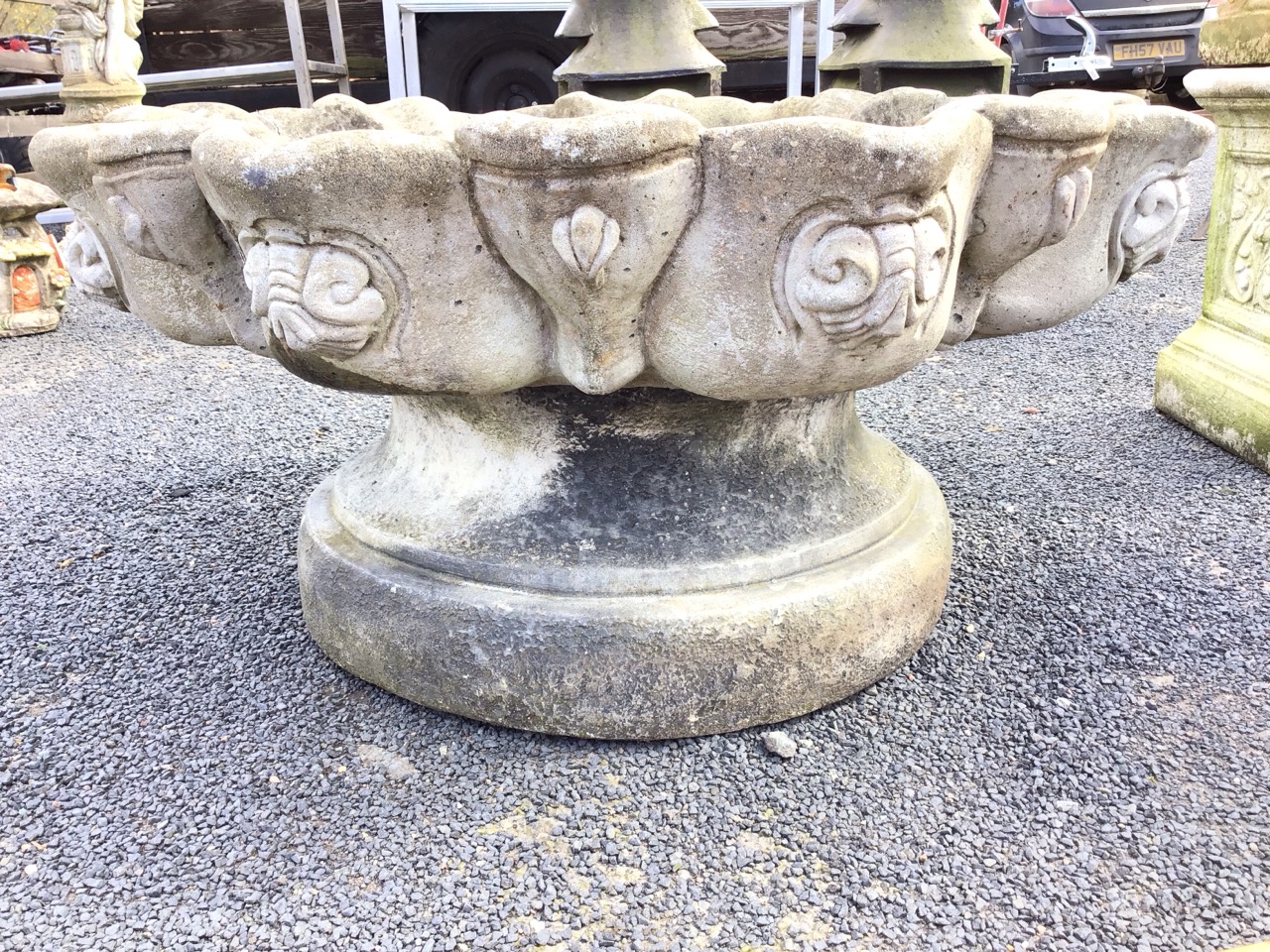 A circular composition stone garden birdbath, the scalloped bowl cast with scrolled shell medallions - Image 2 of 3