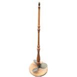 A novelty elm standard tamp with bronze propeller to base above circular platform,