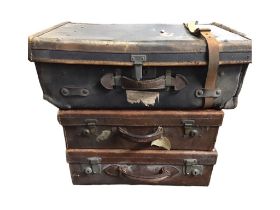 An Edwardian lined leather suitcase with chromed mounts - initialled McM, with key; another lined