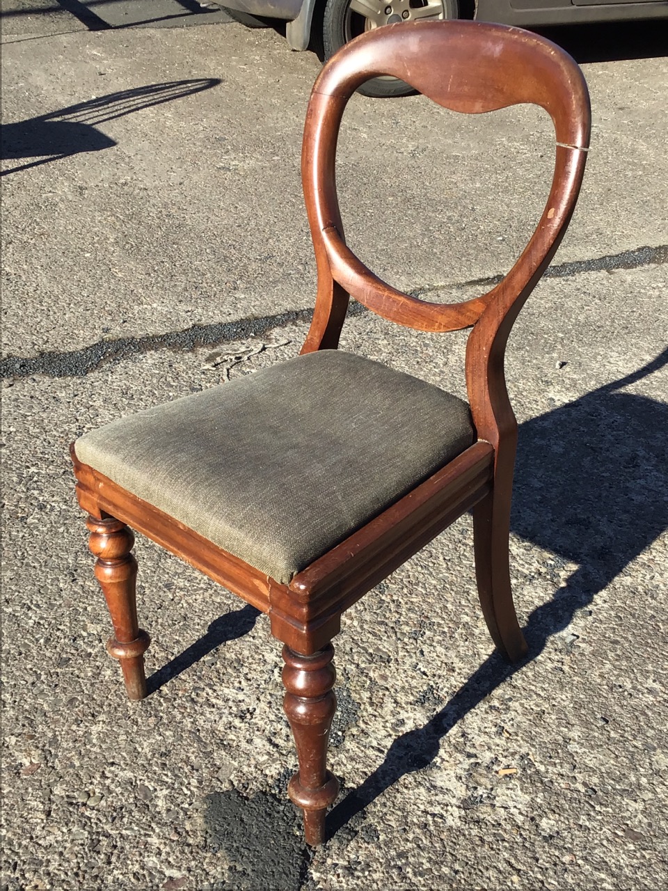 A Victorian mahogany balloon back chair with a drop-in upholstered seat on moulded rails, raised - Image 3 of 3